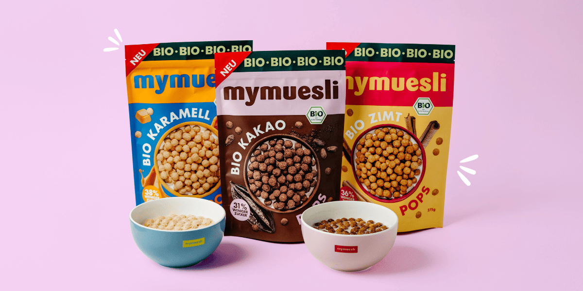 Die drei mymuesli Bio Cereals Sorten: Bio Karamell Pops, Bio Kakao Pops und Bio Zimt Pops als Teil des Breakfast Heroes Bundles