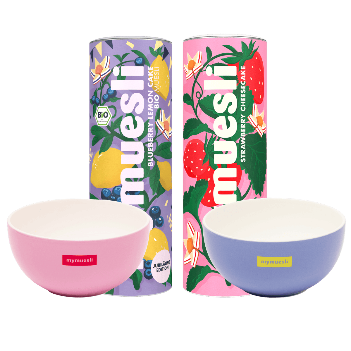 Geburtstagspaket bestehend aus Blueberry Lemon Cake, Strawberry Cheesecake und zwei Müslischalen in hellblau und rosa. 