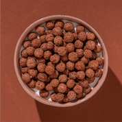 mymuesli Bio Kakao Pops in Schale mit Joghurt